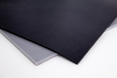 Medium Closed Cell Silicone Foam, Transportation Grade, two squares, gray and black