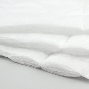 3 sheets of white acoustic insulation overlapping