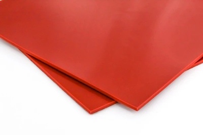 Two orange squares of Silicone, Specification Grade, overlapping