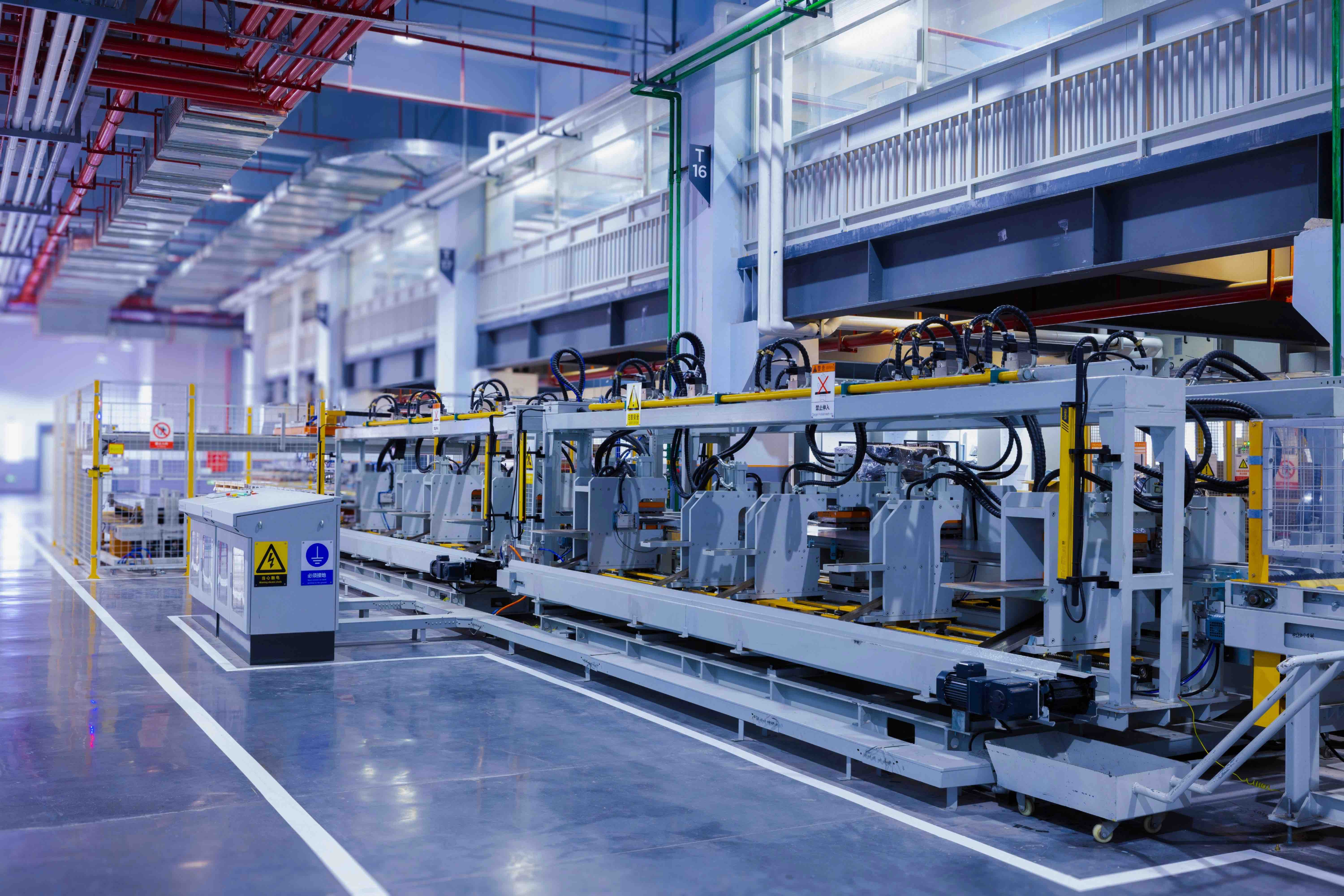 manufacturing plant, with a line of machinery
